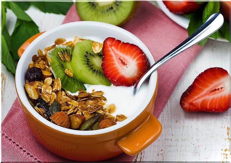 A bowl of yogurt with fruit - breakfast for a diabetic