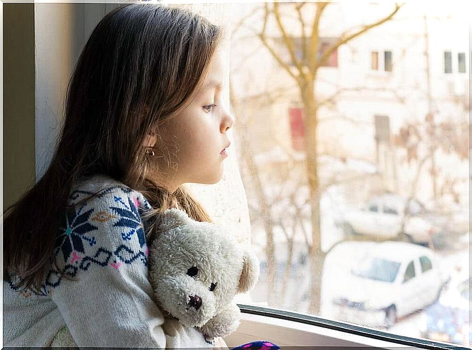 Little girl with a teddy bear