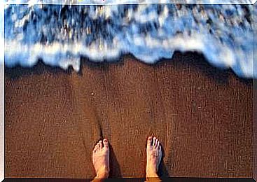 feet by the ocean